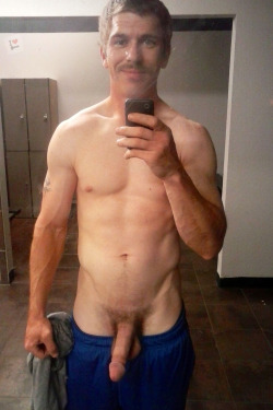 mature-guy-showing-off-at-dressing-room
