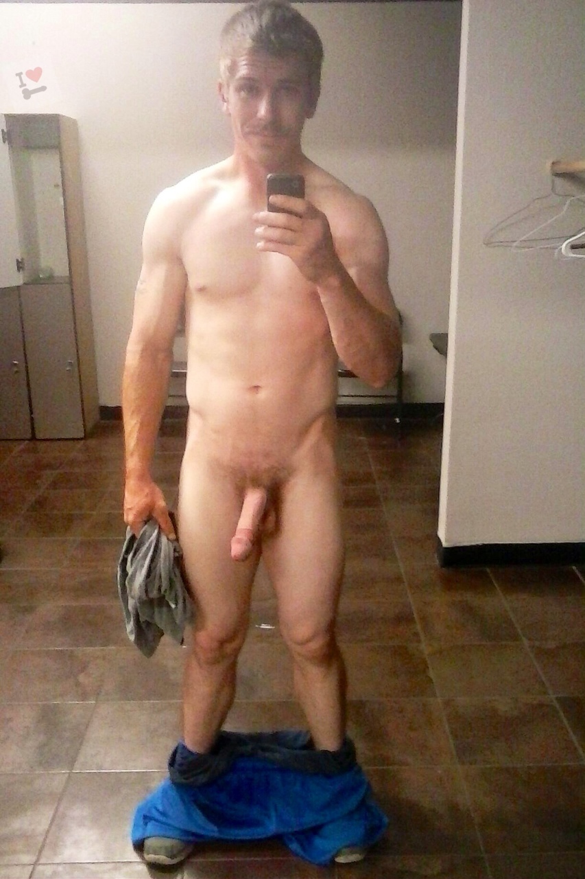 mature-guy-showing-off-at-dressing-room