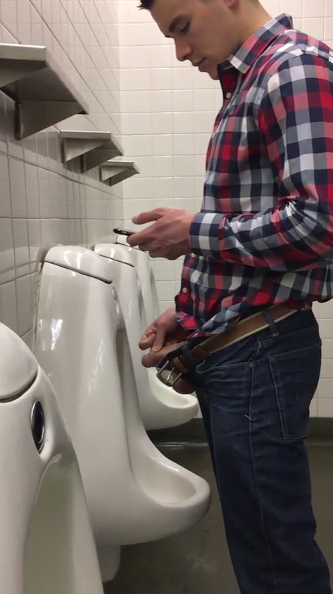 texting while pissing at urinals