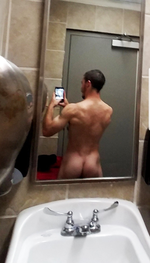 hunky-marine-showing-butt-in-mirror